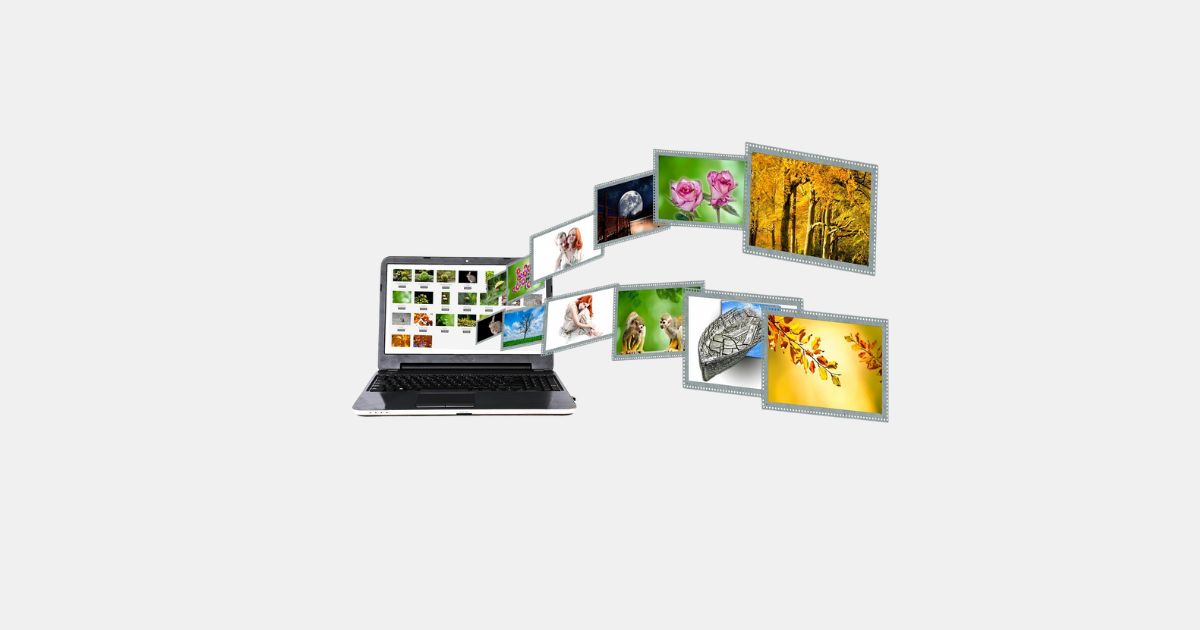 a laptop with many pictures coming out of it